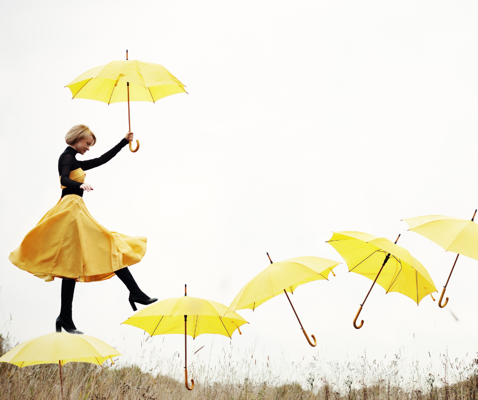 A woman stepping on floating umbrellas